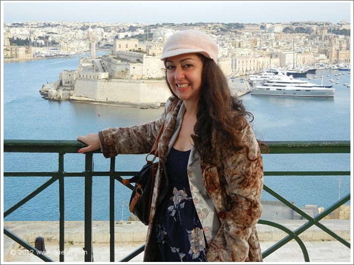 Gülay Princess in Upper Barracca Gardens in front of Il Birgu