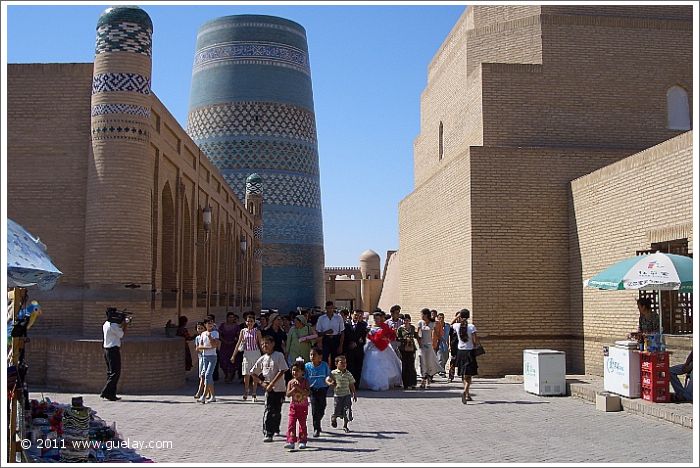 traditional weddig procession in the ancient city of Khiva