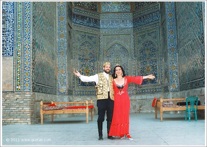 Josef Olt And Gülay Princess in the courtyard of Sher Dor Madrasah, Samarkand (1997)