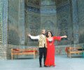 Josef Olt And Gülay Princess in the courtyard of Sher Dor Madrasah, Samarkand (1997)