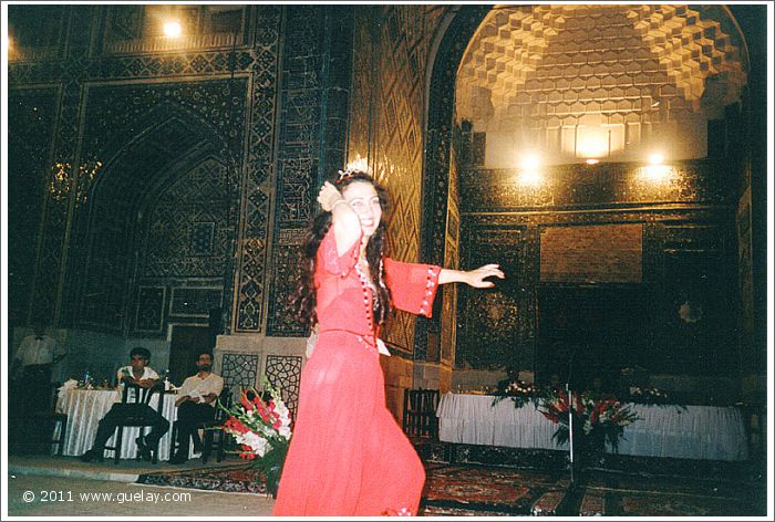 Gülay Princess at banquet in courtyard of Ulugh Beg Madrasah, Samarkand (1999)